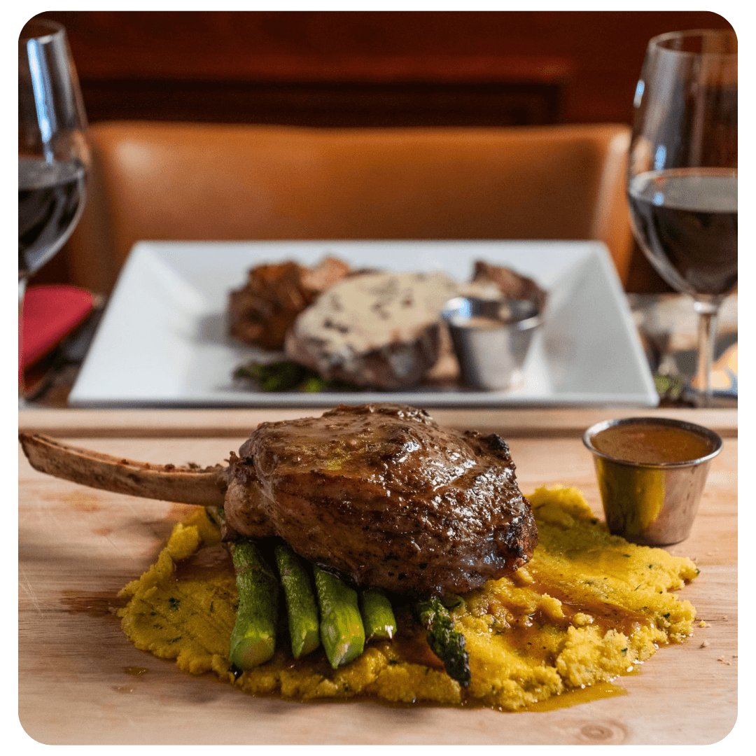 Steak entree on a wooden board